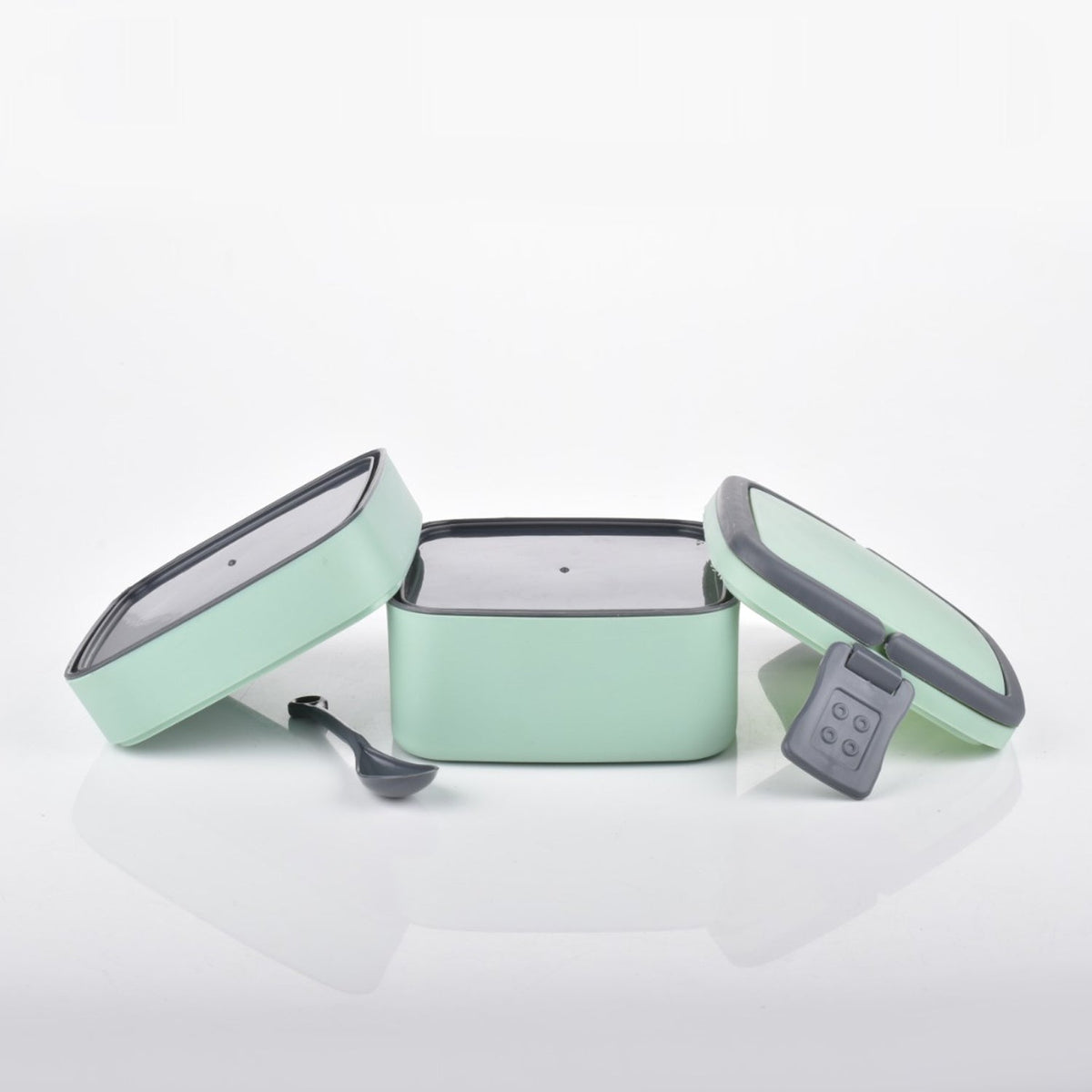 green lunch box with spoon 