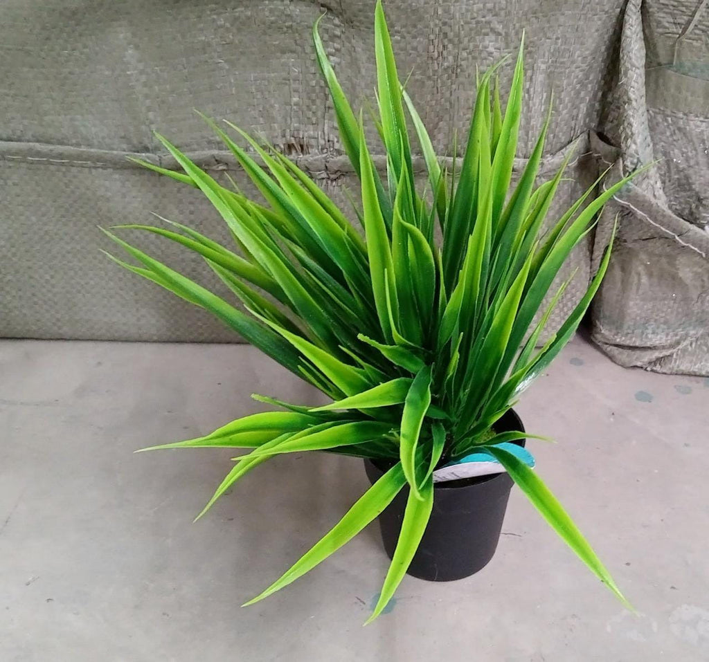 Artificial potted plant with pot, perfect for home decoration.